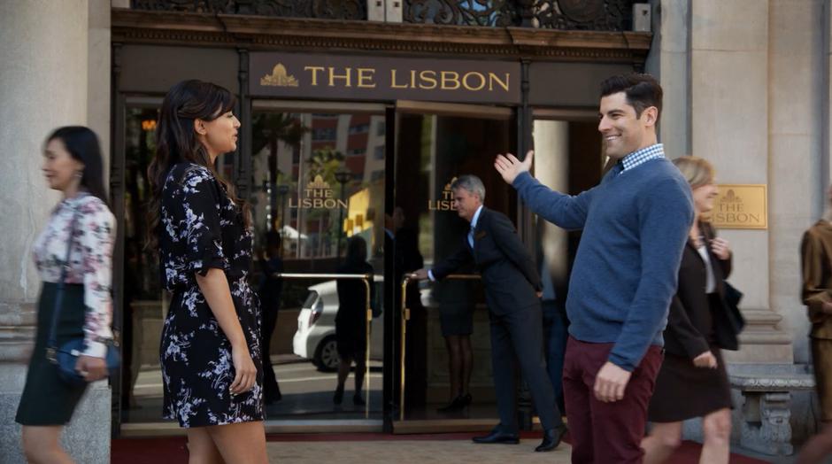 Schmidt motions to the entrance to the fancy hotel while Cece looks skeptical.