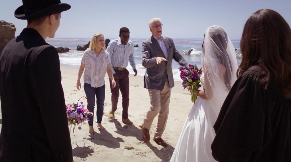 Eleanor, Chidi, and Michael run up to Jason, Tahani, and Janet to stop the wedding.