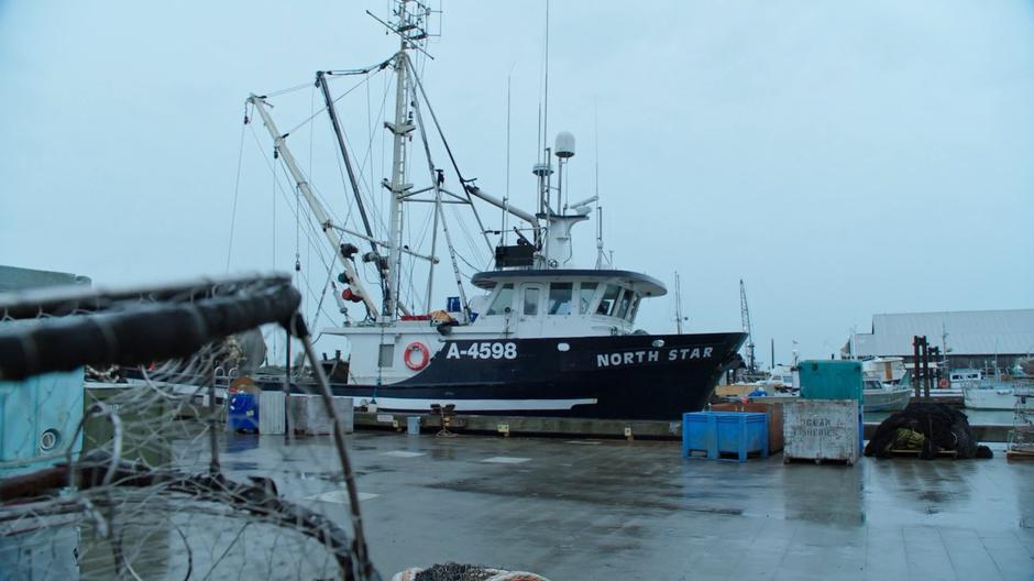 Establishing shot of the North Star sitting at the dock in the morning.