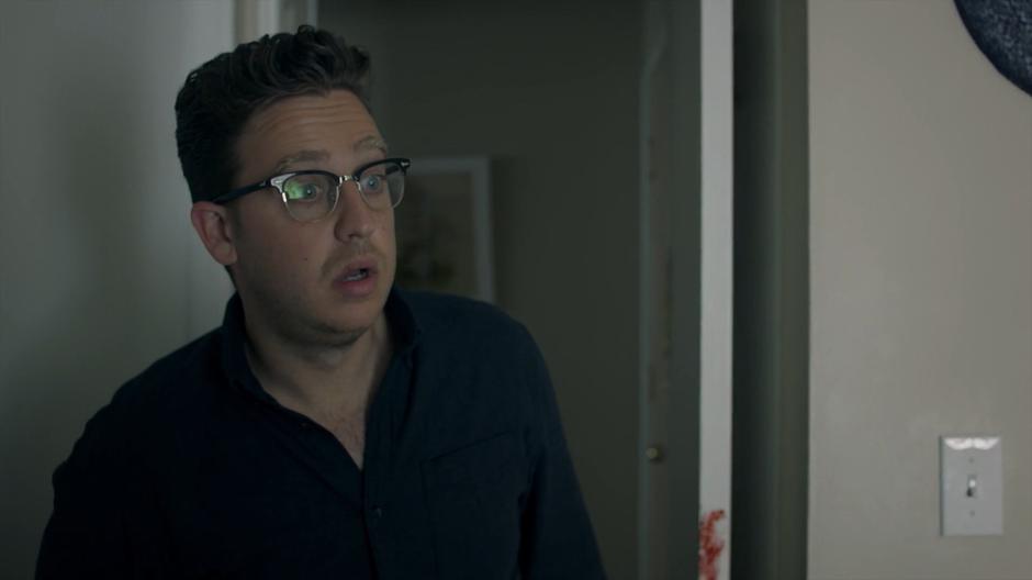 Josh's eyes goes wide when he looks into Enid's bedroom.