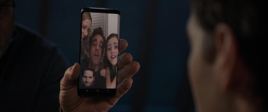 Maggie, Paxton, and Cassie chat with Scott through his phone.