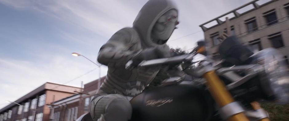 Ghost rides off on her stolen motorcycle.