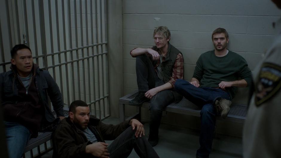 Calvin, Xander, Chris, and Ben look up at Dale tells them the charges have been dropped.