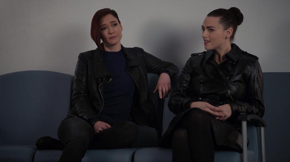Alex sits down next to Lena in the waiting room and they talk.