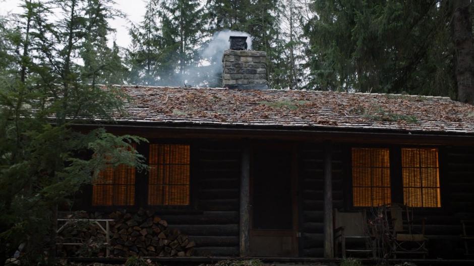 Establishing shot of the exterior of the cabin.
