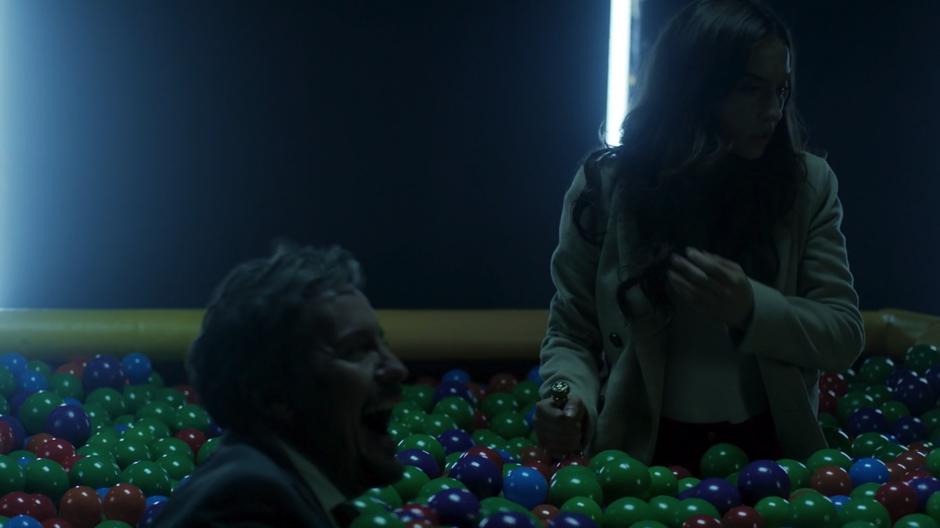The Beast and Julia look around after appearing in a ball pit.