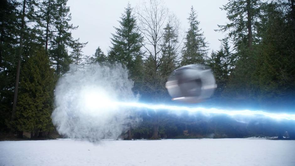 The Time Sphere races towards the portal being held open by the Speed Force cannon.