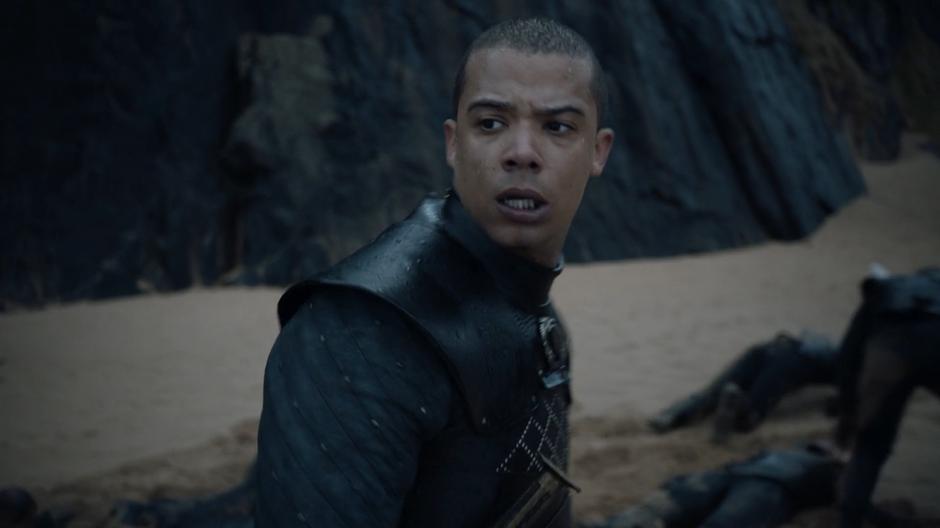 Grey Worm searches the beach for Missandei among the survivors.