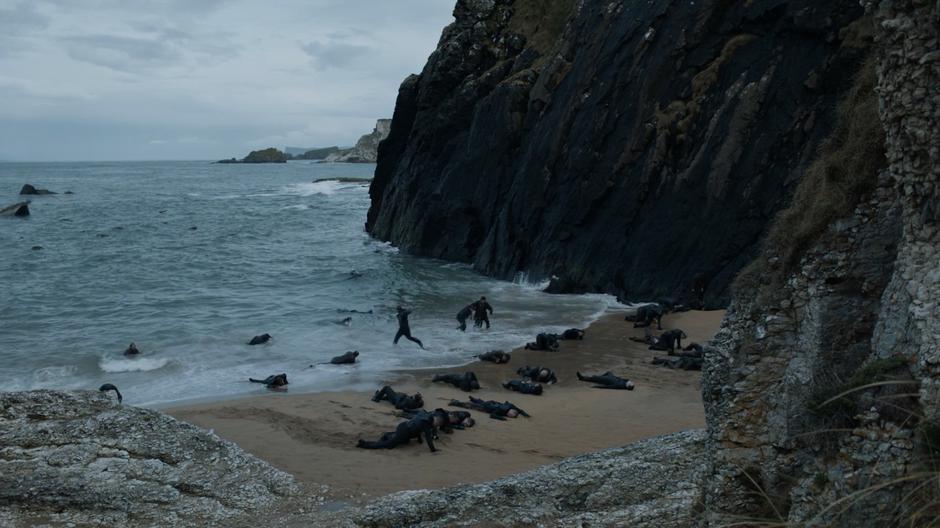 Grey Worm runs back out into the ocean as the survivors drag themselves ashore.