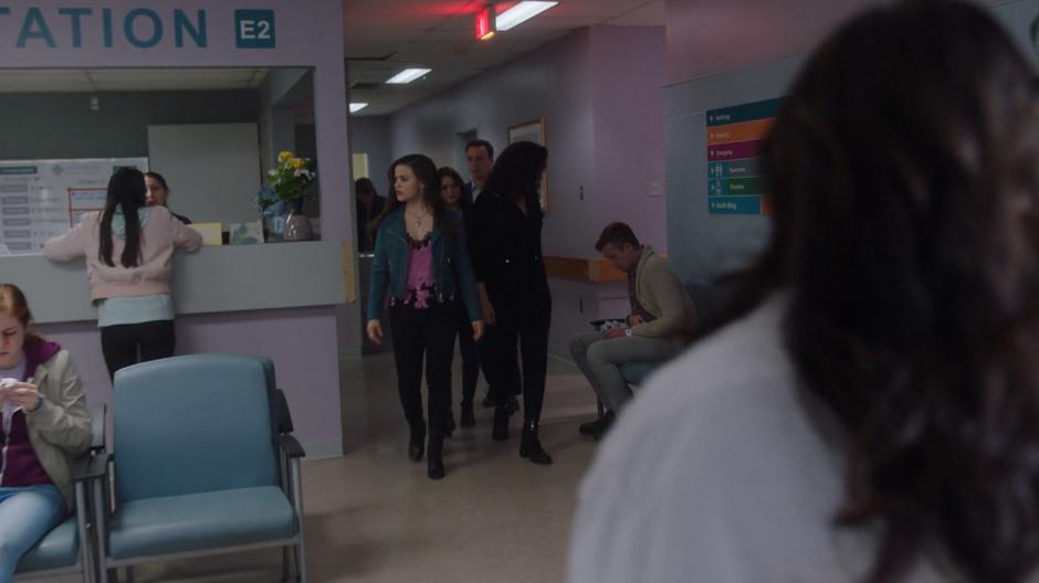 Maggie, Macy, Mel, and Harry enter the hospital and look around for Galvin.