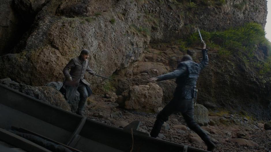 Jaime and Euron run towards each other with swords drawn.