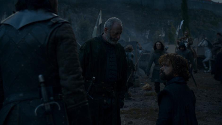 Tyrion briefs Davos on the Queen's wishes after coming ashore with Jon.