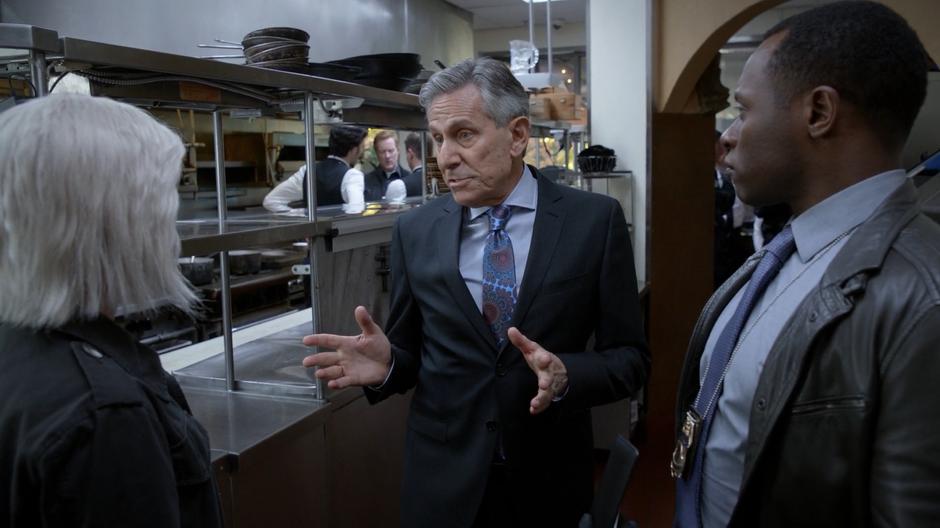 The owner of the restaurant talks to Liv and Clive about Chef's many enemies while they stand in the kitchen.