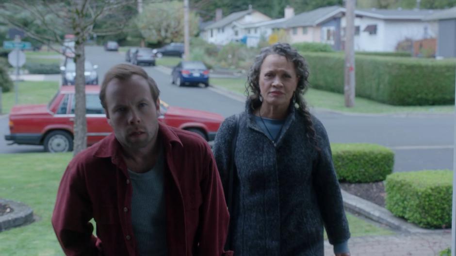 Rick and Helen approach the front door of Beth's home.