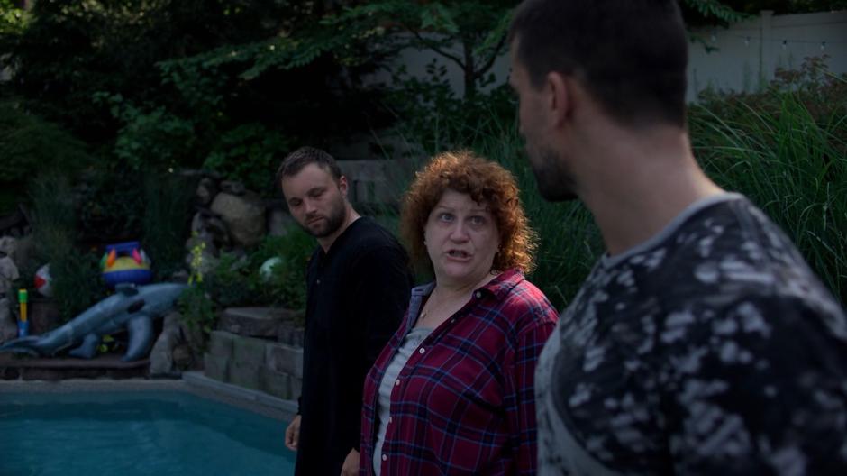 Sal Blaskowski talks to her sons after throwing Erik into the pool.