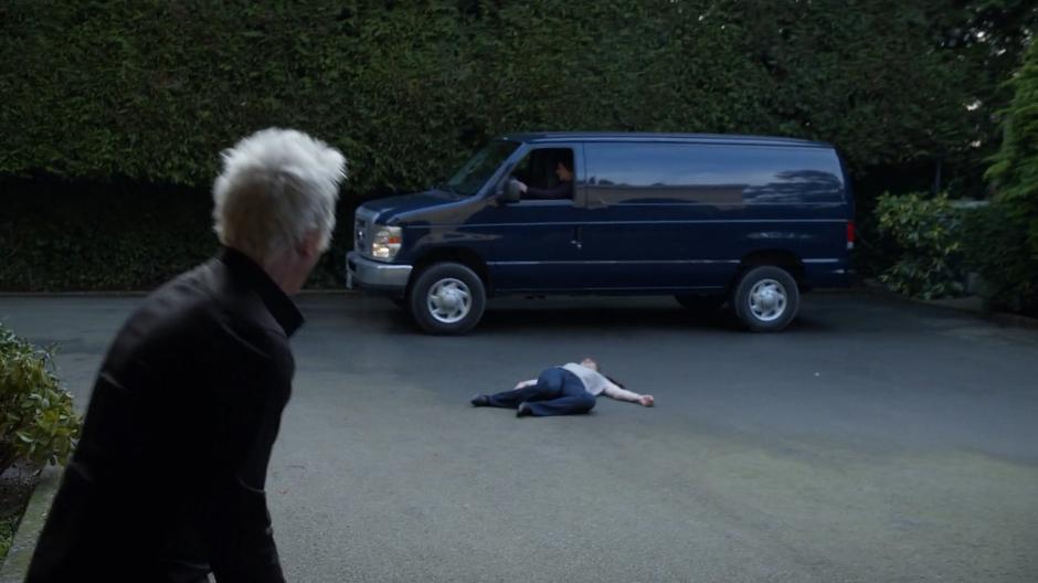 The van begins to pull out while Blaine runs over to Peyton's body sprawled on the ground.