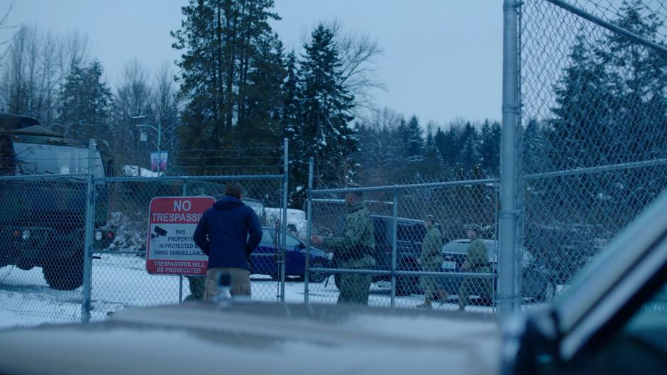 The guards open the gate for Ben.