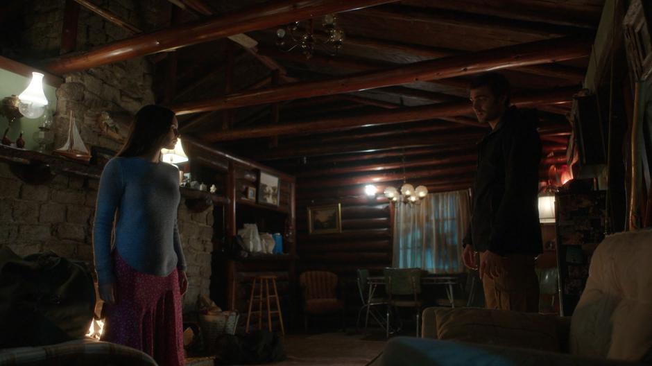Ben talks to Ryn inside the cabin.
