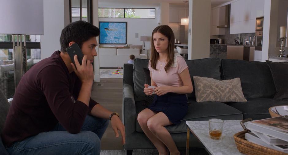 Stephanie sits on the couch as Sean gets a call from the police about Emily.