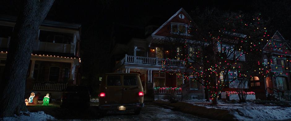The Vasquez van pulls into the driveway in front of their house in the evening when bringing Billy home for the first time.