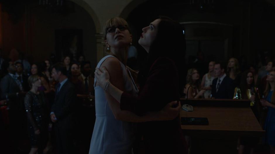 Kara and Lena pulls away from their hug as the power shuts down.