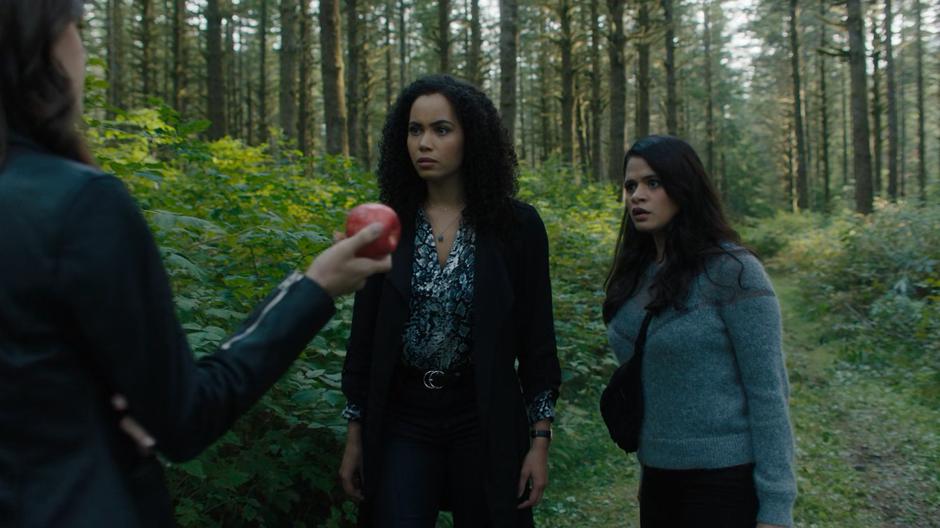 Macy and Mel find Abigael happily munching on an apple after they have escaped the Kyon.