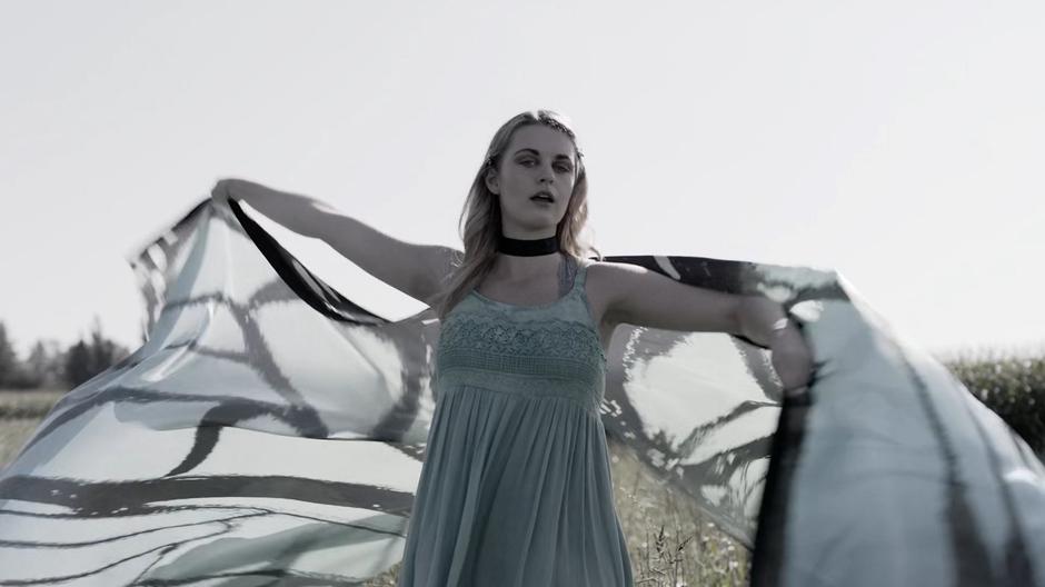 A woman dances around during the Collective Dream advertisement.