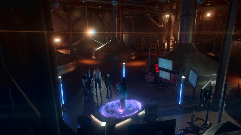 Molly, Chase, Gert, Karolina, and Nico stand around as Xavin steps back onto the portal with the baby.