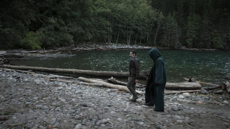 Jim Corrigan talks to Oliver about what must be done as they walk along the shore.