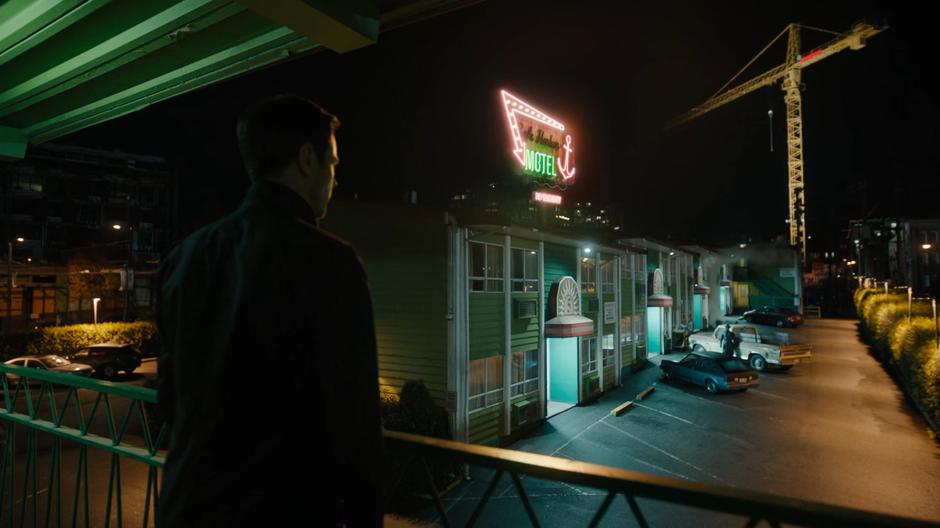 Harry looks out over the parking lot where he sees a strange figure.