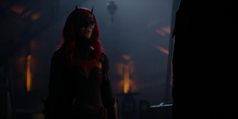 Kate steps out of the shadows as Batwoman to give Sophie some advice.