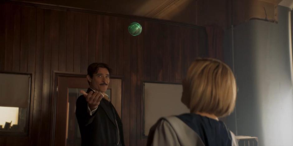 The Doctor watches as Nikola Tesla releases the strange floating ball.