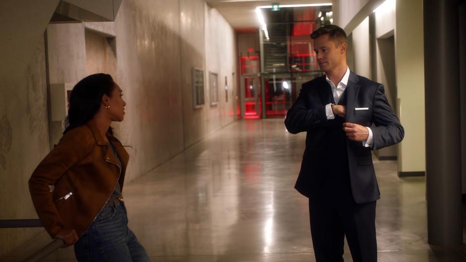 Joseph Carver emerges from the secure area to find Iris waiting for him before his press conference.