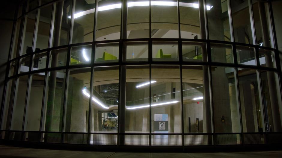 View in to the building's atrium at night.