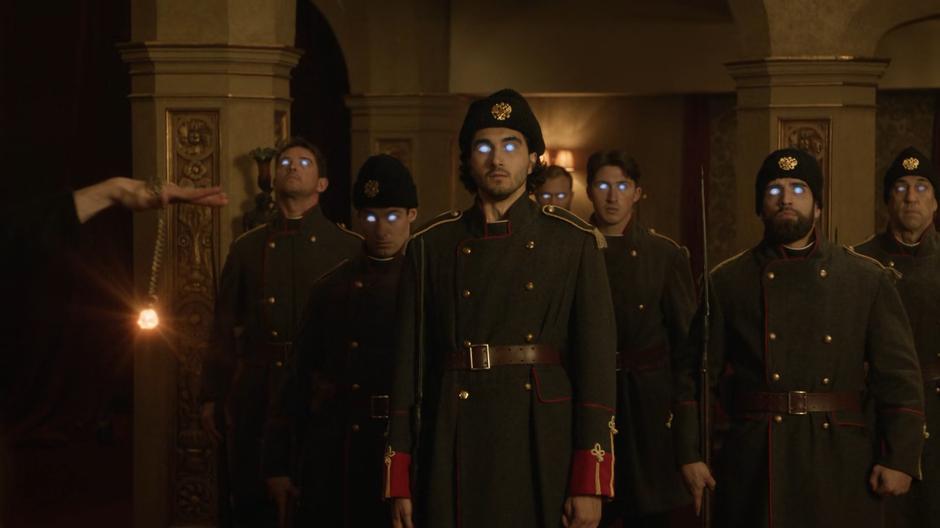 The eyes of Behrad and the guards glow white when they are controlled by Rasputin.