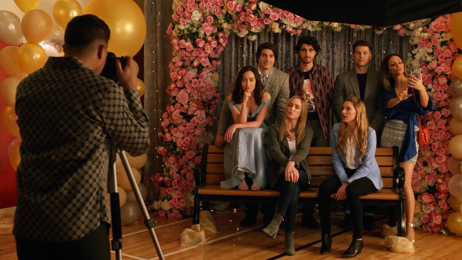 Nora, Ray, Sara, Behrad, Ava, Nate, and Zari get their pictures taken.
