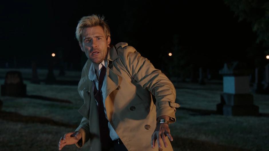 Constantine leans back as Jeanie Hill's car explodes.