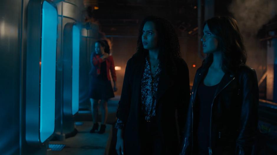 Maggie, Macy, and Abigael examine the contents of the canisters through the glass windows.