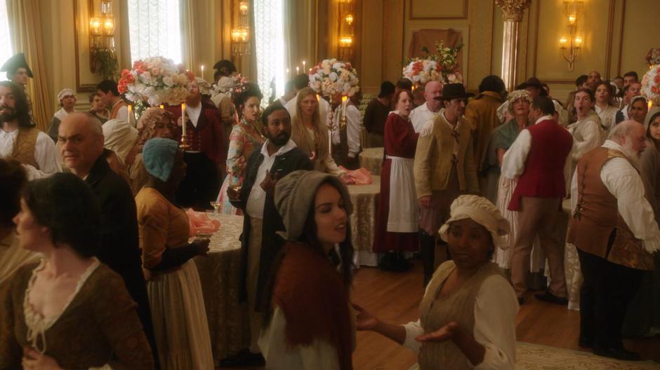 Zari and Ava watch as a guillotine is wheeled into the room.