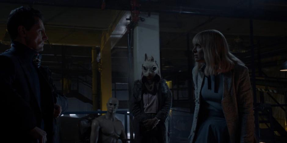 Alice confronts August Cartwright after removing his mask.