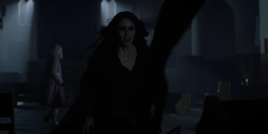 Nocturna runs towards the blood she has already collected from Mary as Alice walks over to Kate.