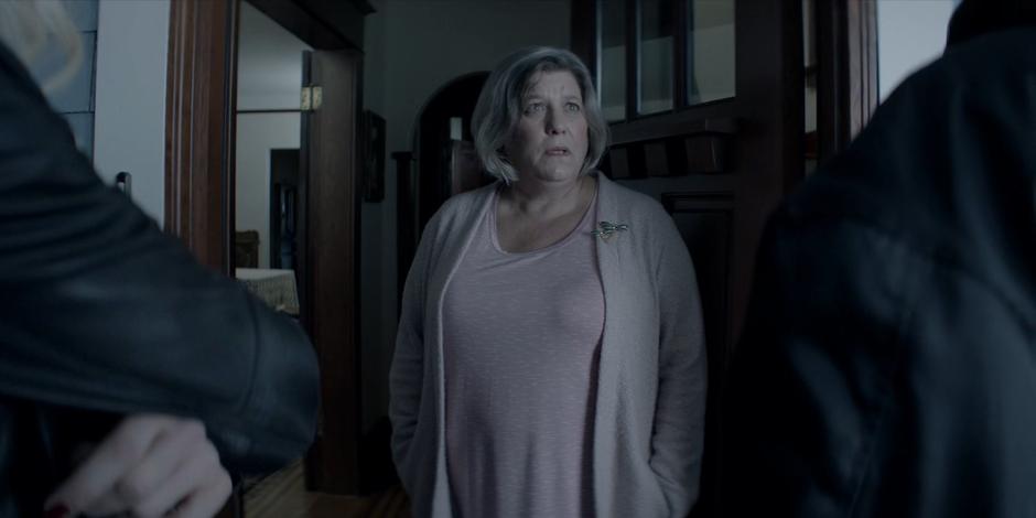 Tammy opens the door and asks why Alice and Kate are at her house.