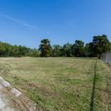 Photograph of Empty Lot off Poche Court West.