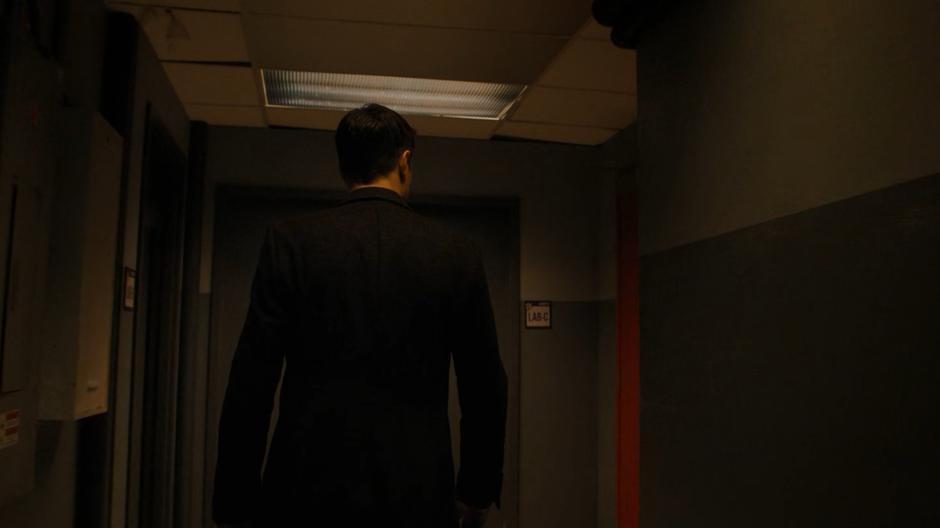 Harry approaches the door to the labs.