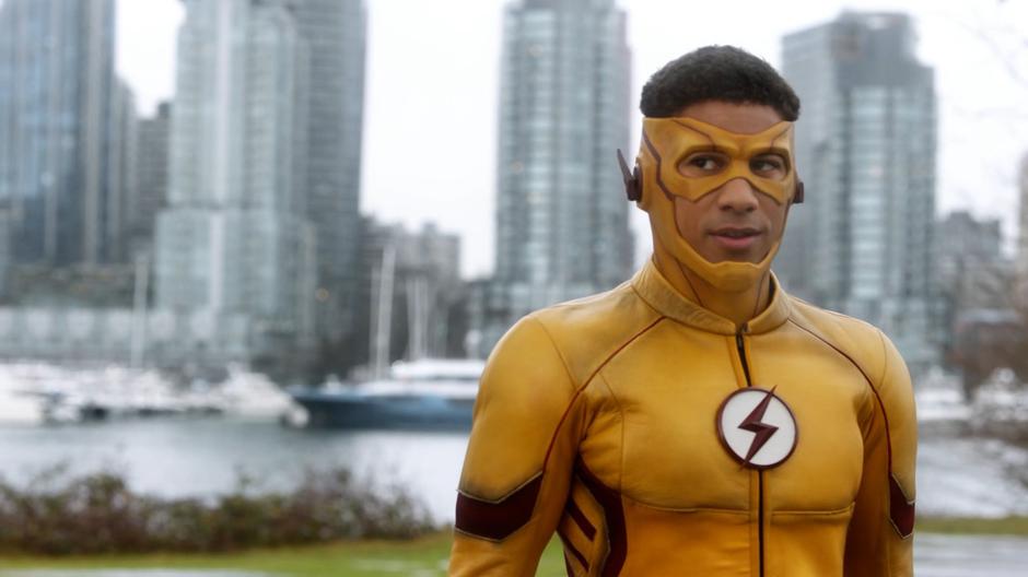 Wally looks over at Barry after saving the helicopter's pilot and passengers.