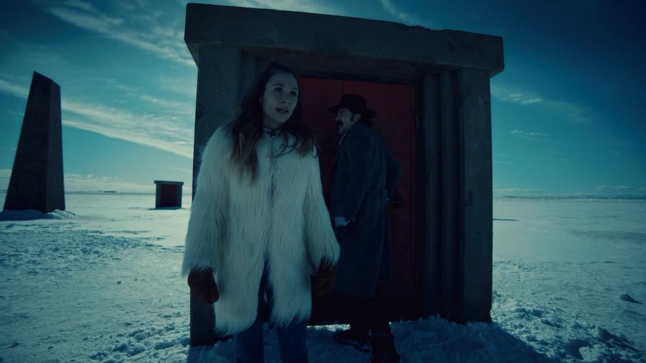 Waverly and Doc look around the snow-covered Garden after finding all of the doors locked.