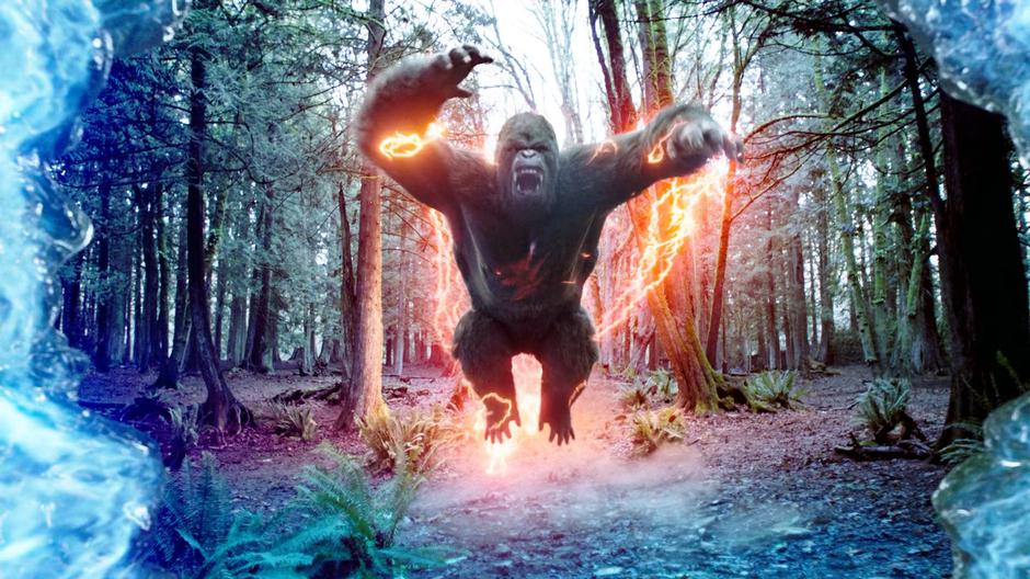 Grodd leaps through the portal using Barry's speed.