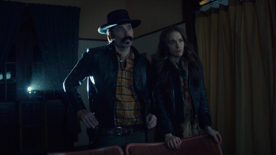 Doc and Wynonna watch the interview with Wyatt Earp.