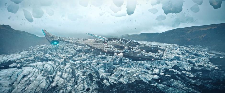 The Discovery settles into the ice on top of the glacier.