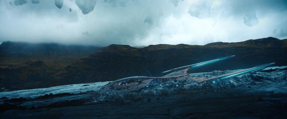 The ice begins to grow around the Discovery as darkness falls.